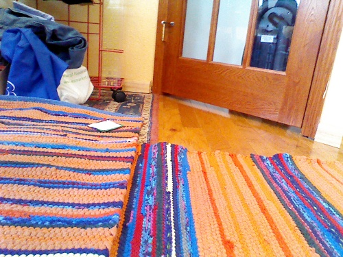 The rug on the left is 36" square and its cousin is 24" x 48".